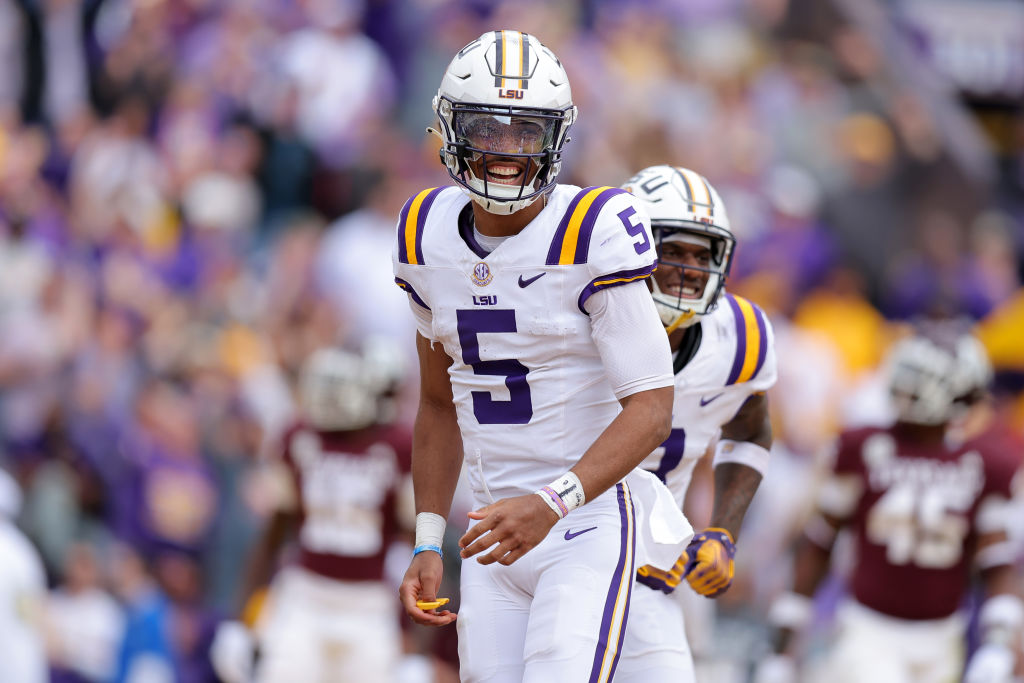 BATON ROUGE, LOUISIANA - NOVEMBER 25: Jayden Daniels #5 of the LSU Tigers celebrates a touchdown during the second half against the Texas A&M Aggies at Tiger Stadium on November 25, 2023 in Baton Rouge, Louisiana. (Photo by Jonathan Bachman/Getty Images)