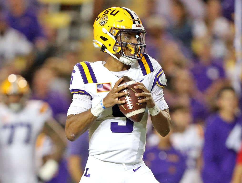 Oct 21, 2023; Baton Rouge, Louisiana, USA; LSU Tigers quarterback Jayden Daniels (5) looks to pass against the Army Black Knights during the first half at Tiger Stadium. Mandatory Credit: Danny Wild-USA TODAY Sports