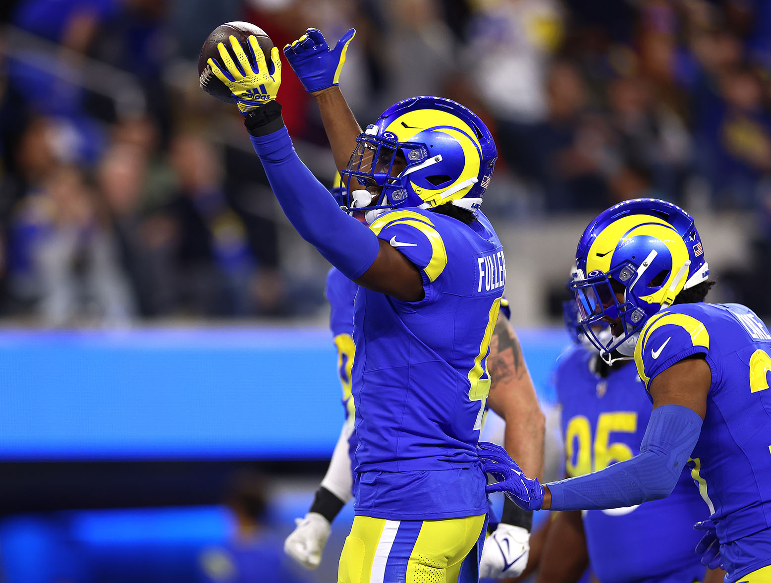 INGLEWOOD, CALIFORNIA - DECEMBER 21: Jordan Fuller #4 of the Los Angeles Rams celebrates with his teammates after intercepting a pass thrown by Derek Carr #4 of the New Orleans Saints during the third quarter of the game at SoFi Stadium on December 21, 2023 in Inglewood, California. (Photo by Katelyn Mulcahy/Getty Images)