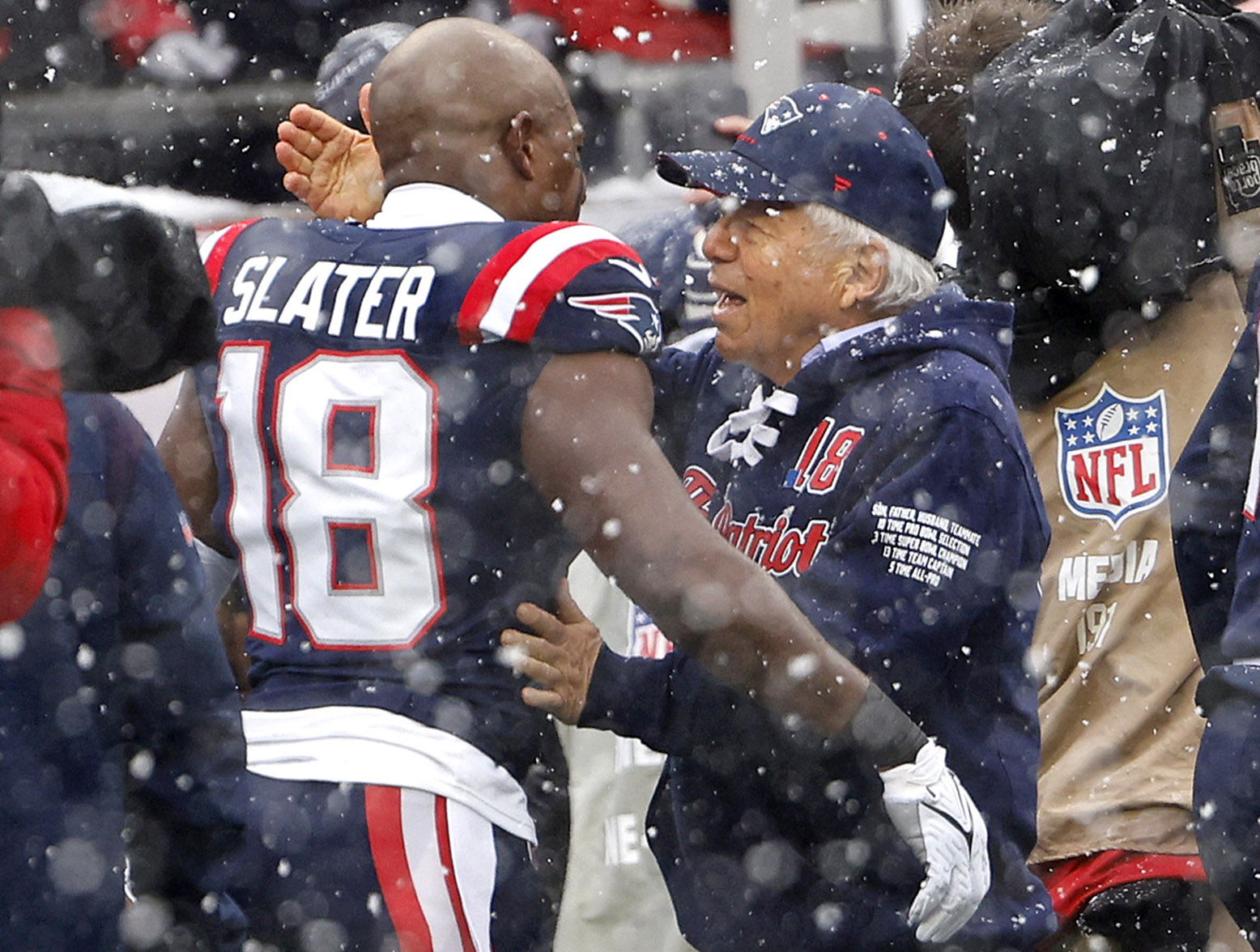 FOXBOROUGH, MASSACHUSETTS - JANUARY 07: Matthew Slater #18 of the New England Patriots and CEO of the New England Patriots Robert Kraft speak before the game at Gillette Stadium on January 07, 2024 in Foxborough, Massachusetts. (Photo by Winslow Townson/Getty Images)