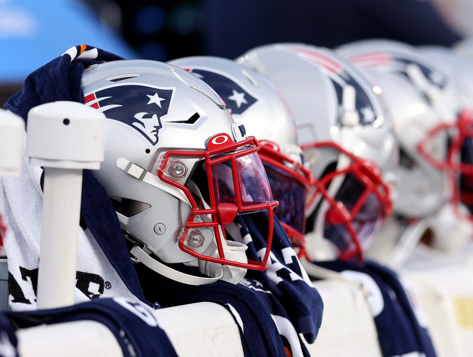 FOXBOROUGH, MASSACHUSETTS - AUGUST 11: A view of New England Patriots helmets on the bench during the preseason game between the New York Giants and the New England Patriots at Gillette Stadium on August 11, 2022 in Foxborough, Massachusetts. (Photo by Maddie Meyer/Getty Images)