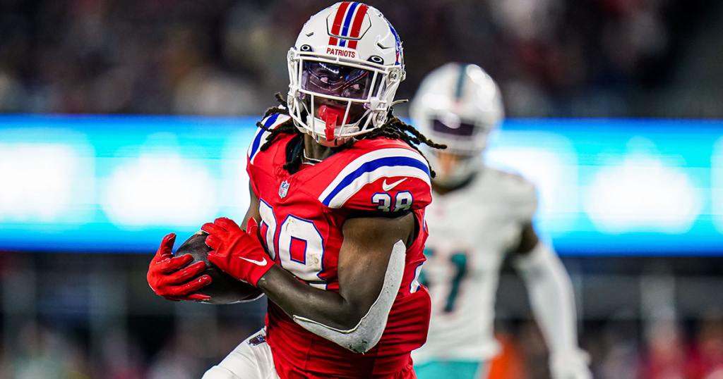 Sep 17, 2023; Foxborough, Massachusetts, USA; New England Patriots running back Rhamondre Stevenson (38) runs the ball against the Miami Dolphins in the second half at Gillette Stadium. Mandatory Credit: David Butler II-USA TODAY Sports