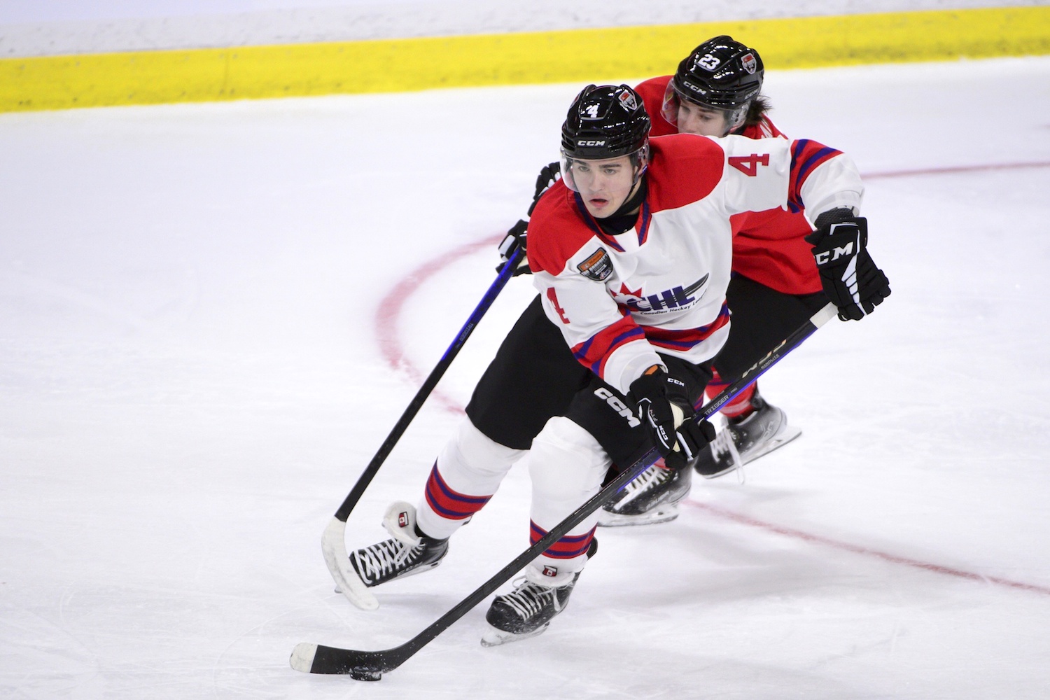 Jan 25, 2023; Langley, BC, CANADA; CHL Top Prospects team white defenseman Hunter Brzustewicz (4) skates during the first period in the 2023 CHL Top Prospects ice hockey game at Langley Events Centre. Mandatory Credit: Anne-Marie Sorvin-USA TODAY Sports