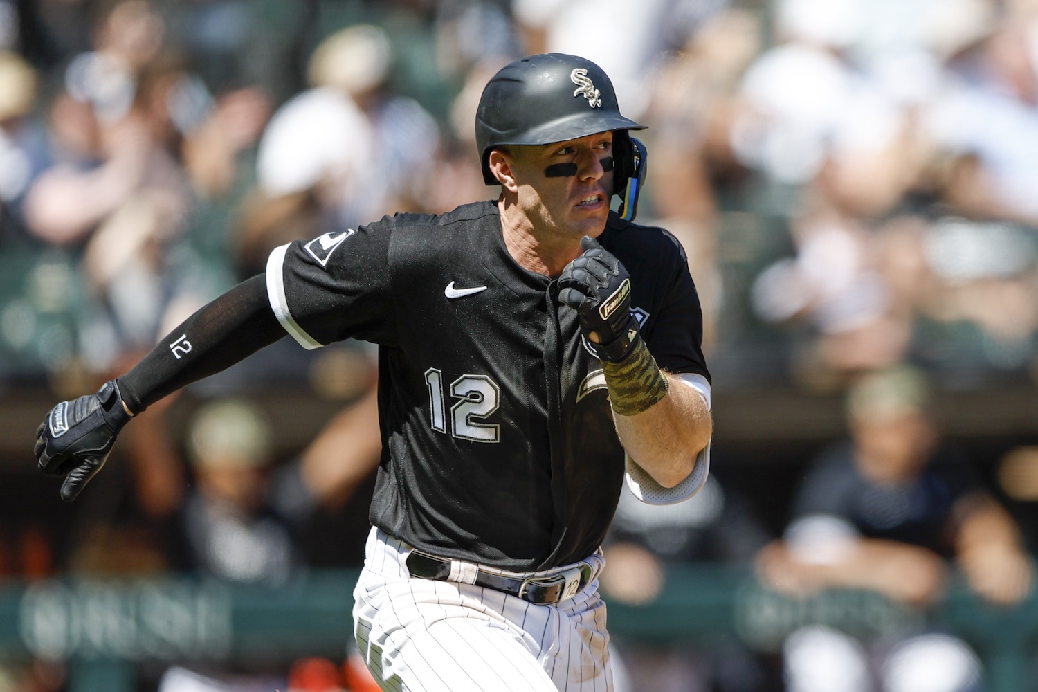 May 21, 2023; Chicago, Illinois, USA; Chicago White Sox right fielder Romy Gonzalez (12) runs after hitting a two-run triple against the Kansas City Royals during the fifth inning at Guaranteed Rate Field. Mandatory Credit: Kamil Krzaczynski-USA TODAY Sports