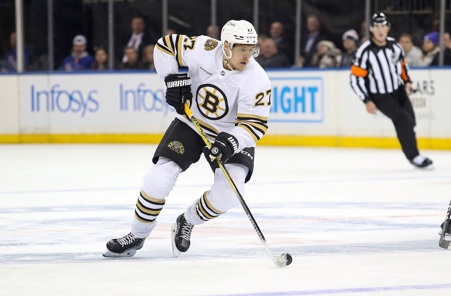 Nov 25, 2023; New York, New York, USA; Boston Bruins defenseman Hampus Lindholm (27) looks to pass against the New York Rangers during the third period at Madison Square Garden. Mandatory Credit: Danny Wild-USA TODAY Sports