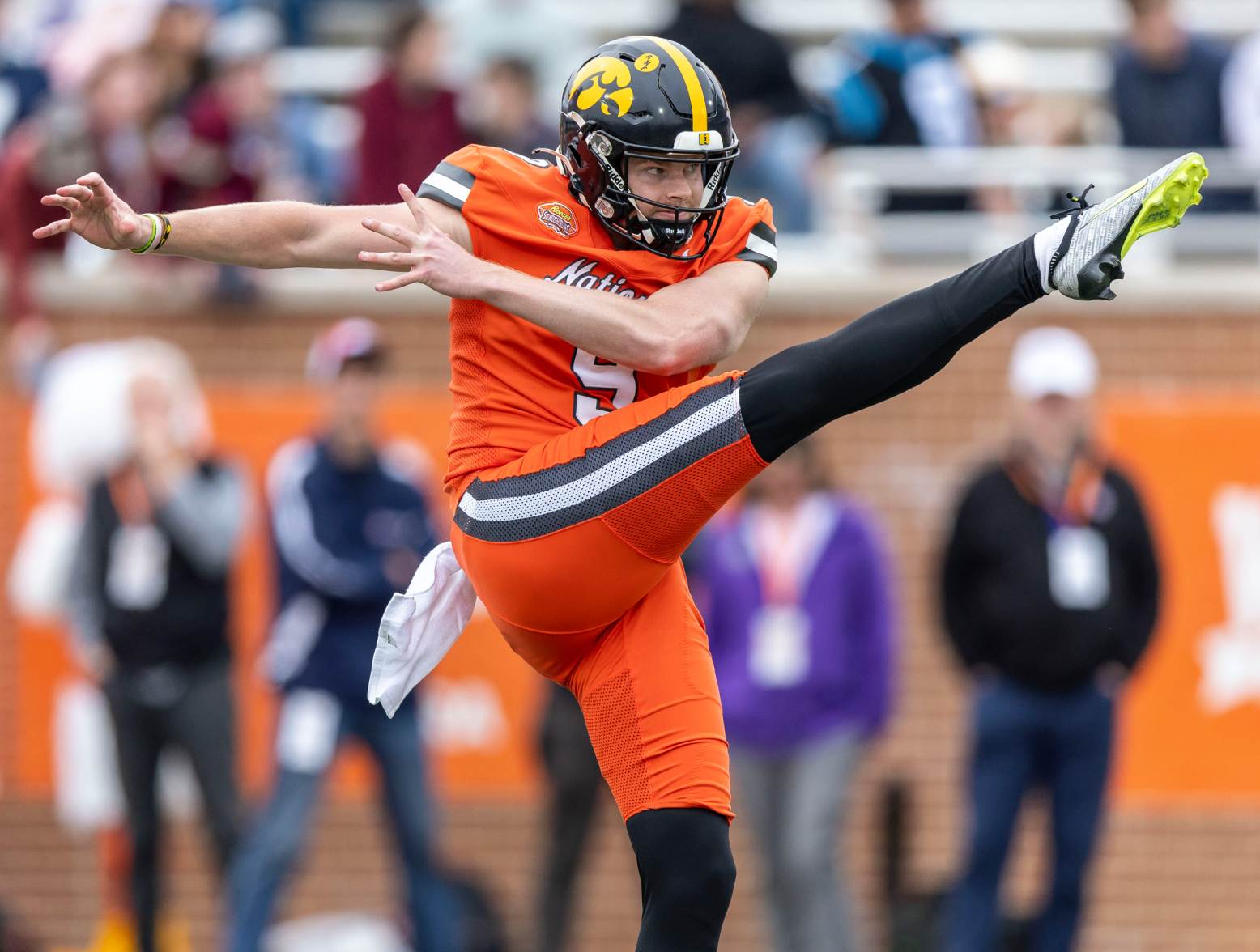 Feb 3, 2024; Mobile, AL, USA; National punter Tory Taylor of Iowa (9) punts during the first half of the 2024 Senior Bowl football game at Hancock Whitney Stadium. Credit: Vasha Hunt-USA TODAY Sports