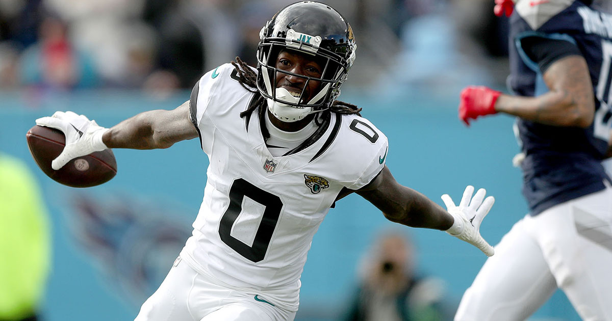 NASHVILLE, TENNESSEE - JANUARY 07: Calvin Ridley #0 of the Jacksonville Jaguars celebrates a touchdown catch during the first half against the Tennessee Titans at Nissan Stadium on January 07, 2024 in Nashville, Tennessee. (Photo by Justin Ford/Getty Images)