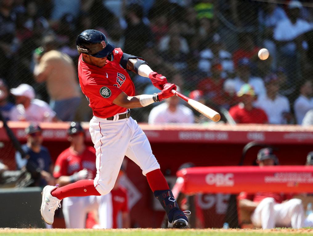 SANTO DOMINGO, DOMINICAN REPUBLIC - MARCH 10: Ceddanne Rafaela #43 of the Boston Red Sox hits a two run home run during the fifth inning against the Tampa Bay Rays during a spring training game at Estadio Quisqueya on March 10, 2024 in Santo Domingo, Dominican Republic. (Photo by Bryan M. Bennett/Getty Images)