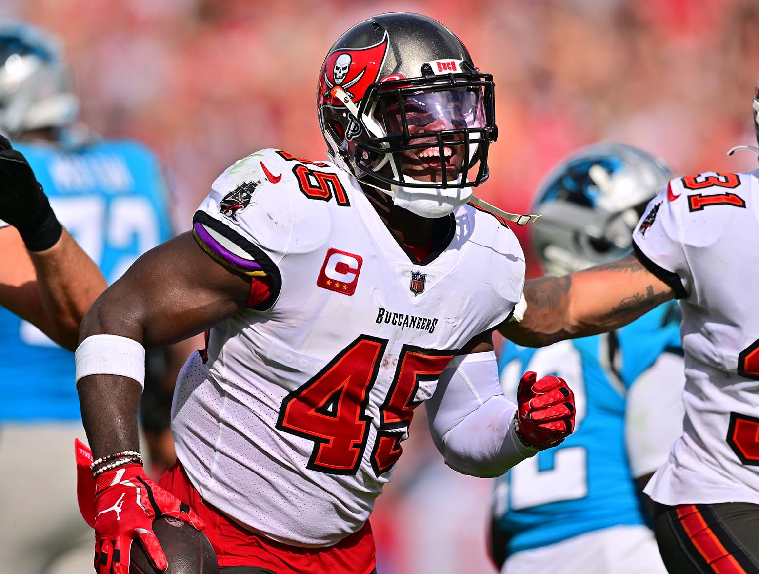 TAMPA, FLORIDA - JANUARY 01: Devin White #45 of the Tampa Bay Buccaneers celebrates after recovering a fumble during the second quarter against the Carolina Panthers at Raymond James Stadium on January 01, 2023 in Tampa, Florida. (Photo by Julio Aguilar/Getty Images)