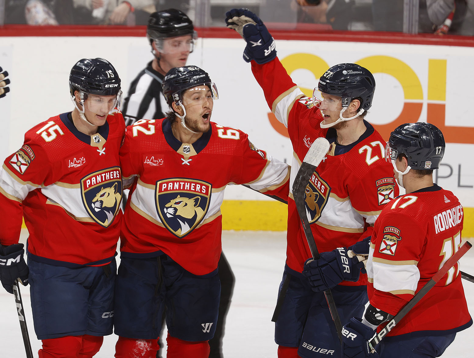 SUNRISE, FL - FEBRUARY 20: Teammates congratulate Brandon Montour #62 of the Florida Panthers after he scored a second period goal against the Ottawa Senators at the Amerant Bank Arena on February 20, 2024 in Sunrise, Florida. (Photo by Joel Auerbach/Getty Images)