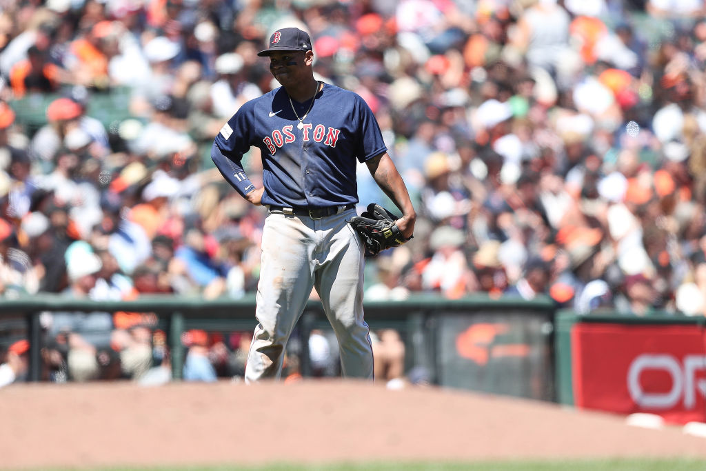 SAN FRANCISCO, CALIFORNIA - JULY 30: Rafael Devers #11 of the Boston Red Sox reacts to making an error on a ball hit by Brandon Crawford #35 of the San Francisco Giants in the bottom of the fifth inning at Oracle Park on July 30, 2023 in San Francisco, California. (Photo by Kavin Mistry/Getty Images)