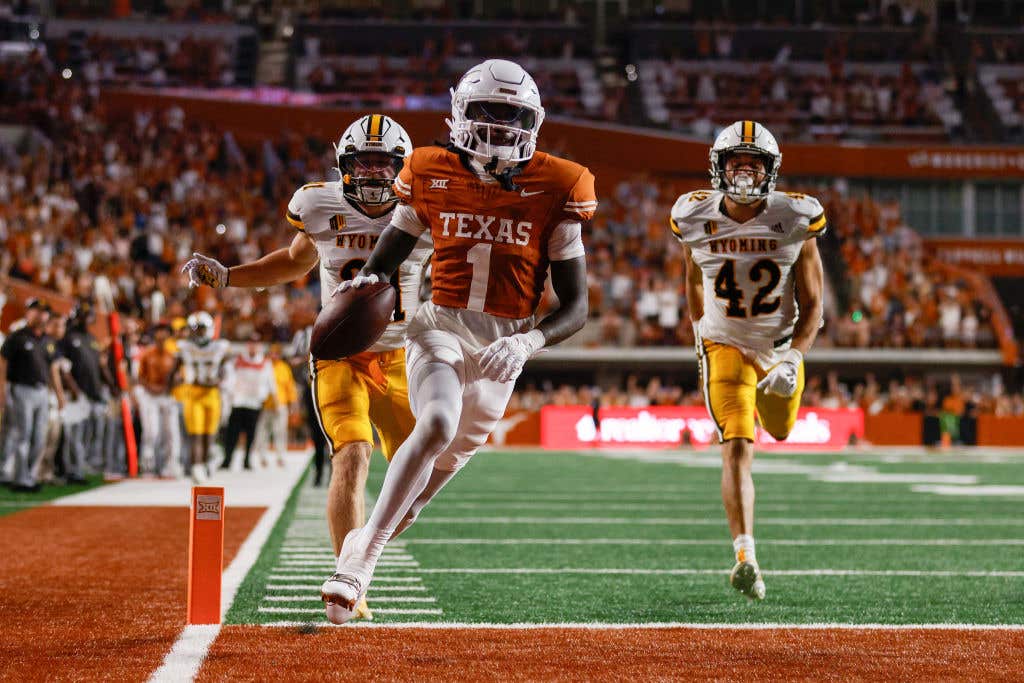 AUSTIN, TEXAS - SEPTEMBER 16: Xavier Worthy #1 of the Texas Longhorns scores a touchdown in the fourth quarter against the Wyoming Cowboys at Darrell K Royal-Texas Memorial Stadium on September 16, 2023 in Austin, Texas. (Photo by Tim Warner/Getty Images)