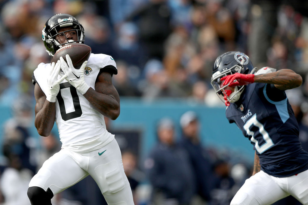 NASHVILLE, TENNESSEE - JANUARY 07: Calvin Ridley #0 of the Jacksonville Jaguars catches a pass for a touchdown during the first half against the Tennessee Titans at Nissan Stadium on January 07, 2024 in Nashville, Tennessee. (Photo by Justin Ford/Getty Images)