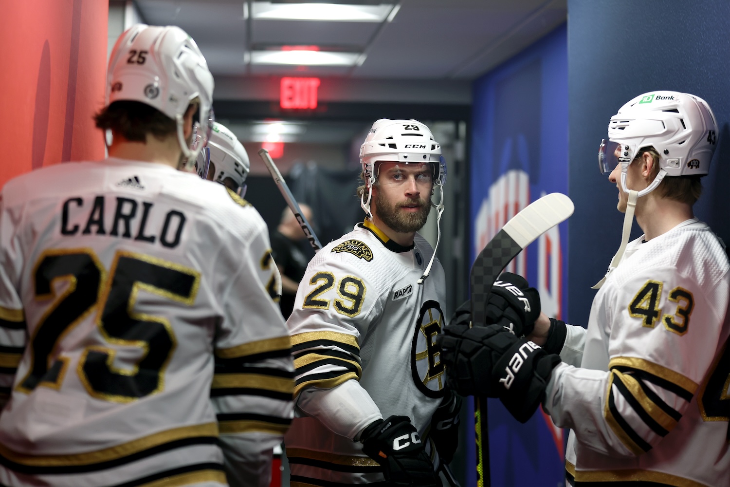 PHILADELPHIA, PENNSYLVANIA - JANUARY 27: Parker Wotherspoon #29 of the Boston Bruins greets teammates before playing against the Philadelphia Flyers at the Wells Fargo Center on January 27, 2024 in Philadelphia, Pennsylvania. (Photo by Tim Nwachukwu/Getty Images)