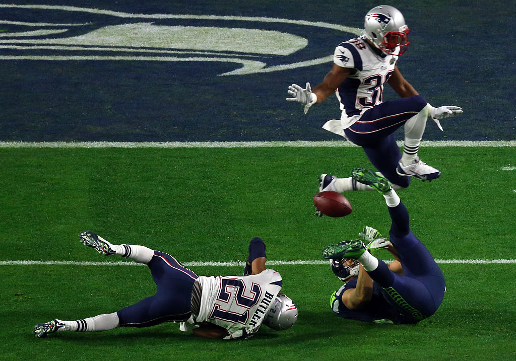 GLENDALE, AZ - FEBRUARY 01:  Jermaine Kearse #15 of the Seattle Seahawks makes a catch against Malcolm Butler #21 and Duron Harmon #30 of the New England Patriots in the fourth quarter during Super Bowl XLIX at University of Phoenix Stadium on February 1, 2015 in Glendale, Arizona.  (Photo by Mike Ehrmann/Getty Images)