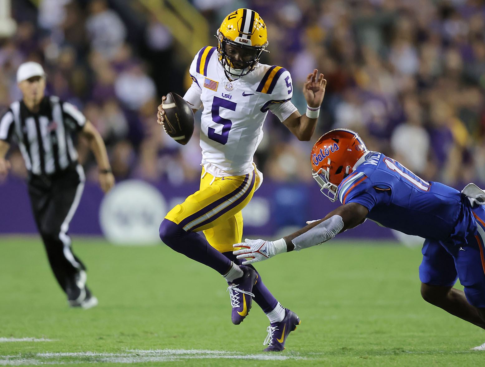 In the latest Patriots mock draft, Jayden Daniels heads to the Patriots at No. 3 overall. (Photo by Jonathan Bachman/Getty Images)