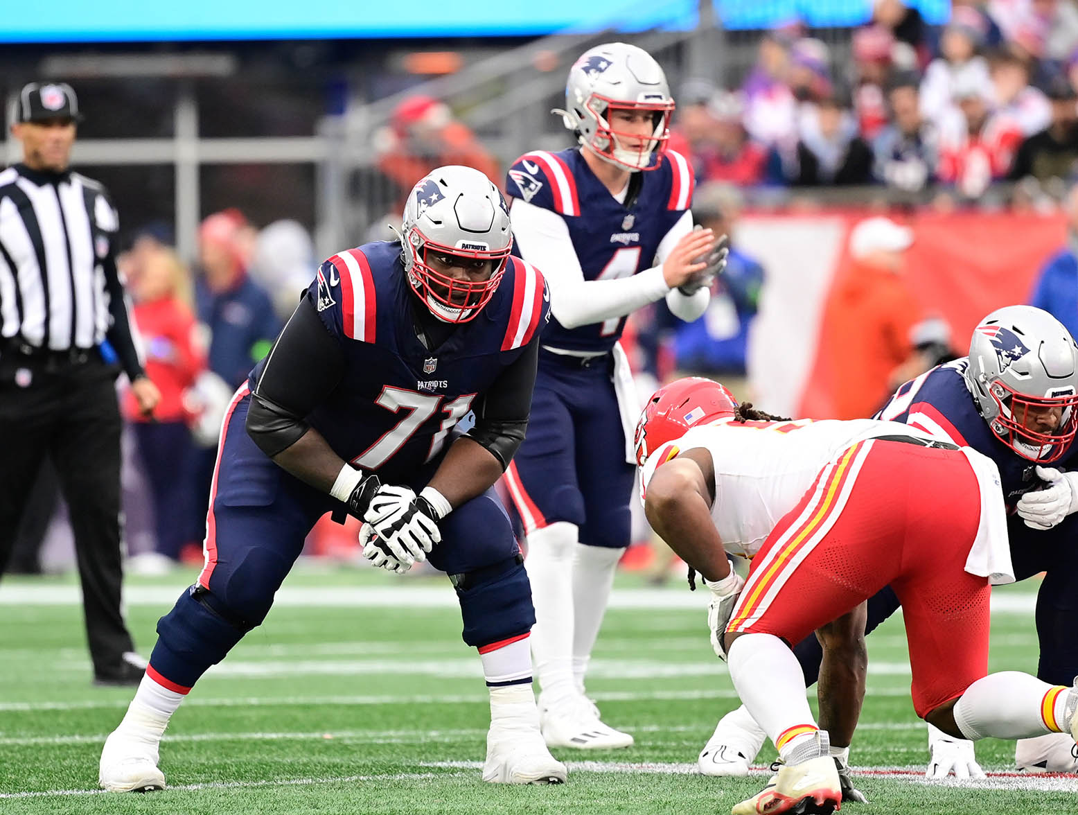 Dec 17, 2023; Foxborough, Massachusetts, USA; New England Patriots guard Mike Onwenu (71) lines up against the Kansas City Chiefs during the second half at Gillette Stadium. Mandatory Credit: Eric Canha-USA TODAY Sports