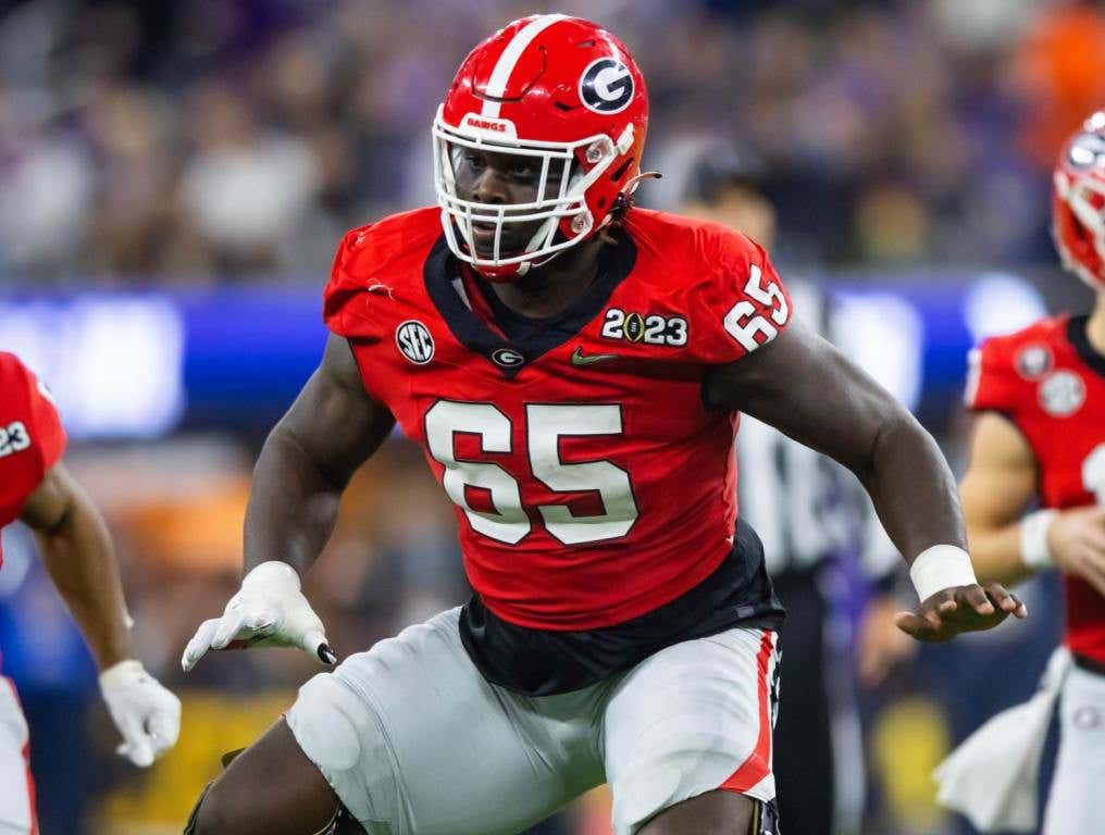 Jan 9, 2023; Inglewood, CA, USA; Georgia Bulldogs offensive lineman Amarius Mims (65) against the TCU Horned Frogs during the CFP national championship game at SoFi Stadium. Credit: Mark J. Rebilas-USA TODAY Sports