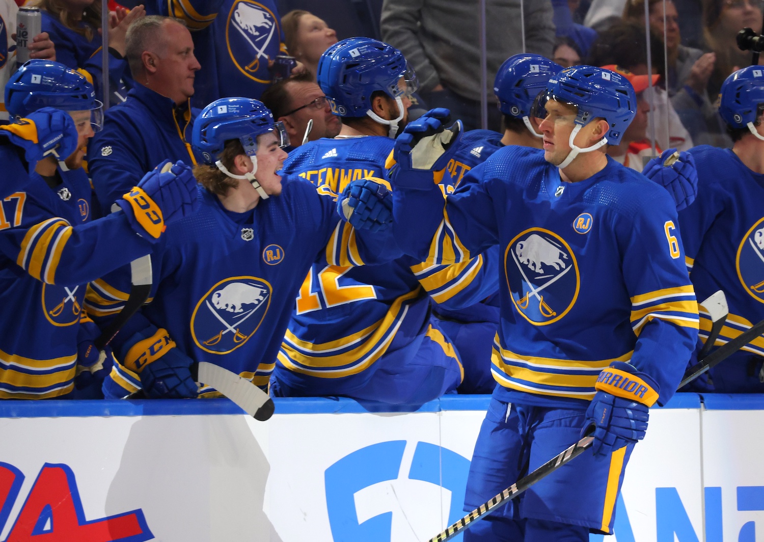 Oct 19, 2023; Buffalo, New York, USA; Buffalo Sabres defenseman Erik Johnson (6) celebrates his goal with teammates during the first period against the Calgary Flames at KeyBank Center. Mandatory Credit: Timothy T. Ludwig-USA TODAY Sports