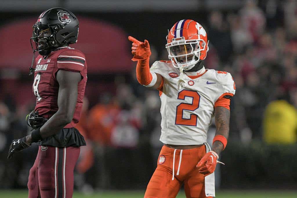 Nov 25, 2023; Columbia, South Carolina, USA; Clemson Tigers cornerback Nate Wiggins (2) smiles after breaking up a pass to South Carolina wide receiver Nyck Harbor (8) during the fourth quarter at Williams-Brice Stadium.  Clemson won 16-7. Credit: Ken Ruinard-USA TODAY Sports