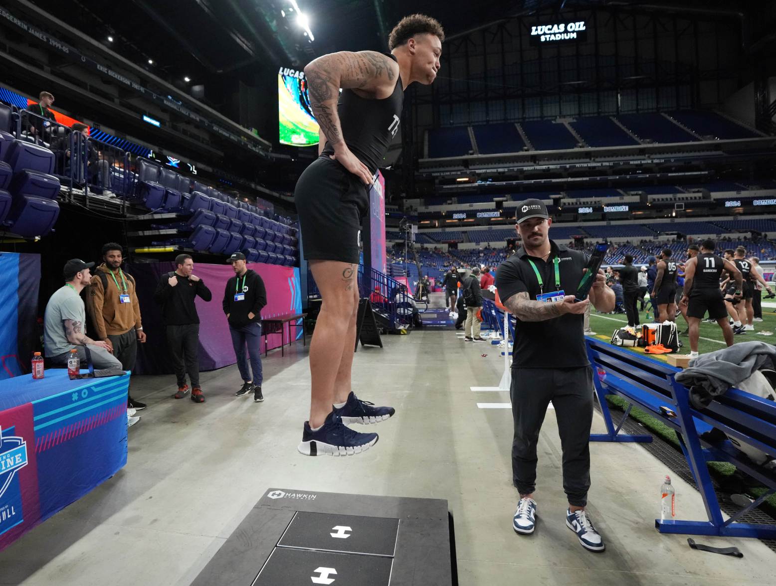 Mar 1, 2024; Indianapolis, IN, USA; Penn State tight end Theo Johnson (TE07) works out during the 2024 NFL Combine at Lucas Oil Stadium. Credit: Kirby Lee-USA TODAY Sports
