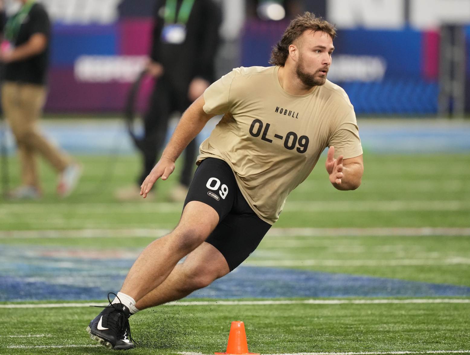 Mar 3, 2024; Indianapolis, IN, USA; Wisconsin offensive lineman Tanor Bortolini (OL09) during the 2024 NFL Combine at Lucas Oil Stadium. Credit: Kirby Lee-USA TODAY Sports