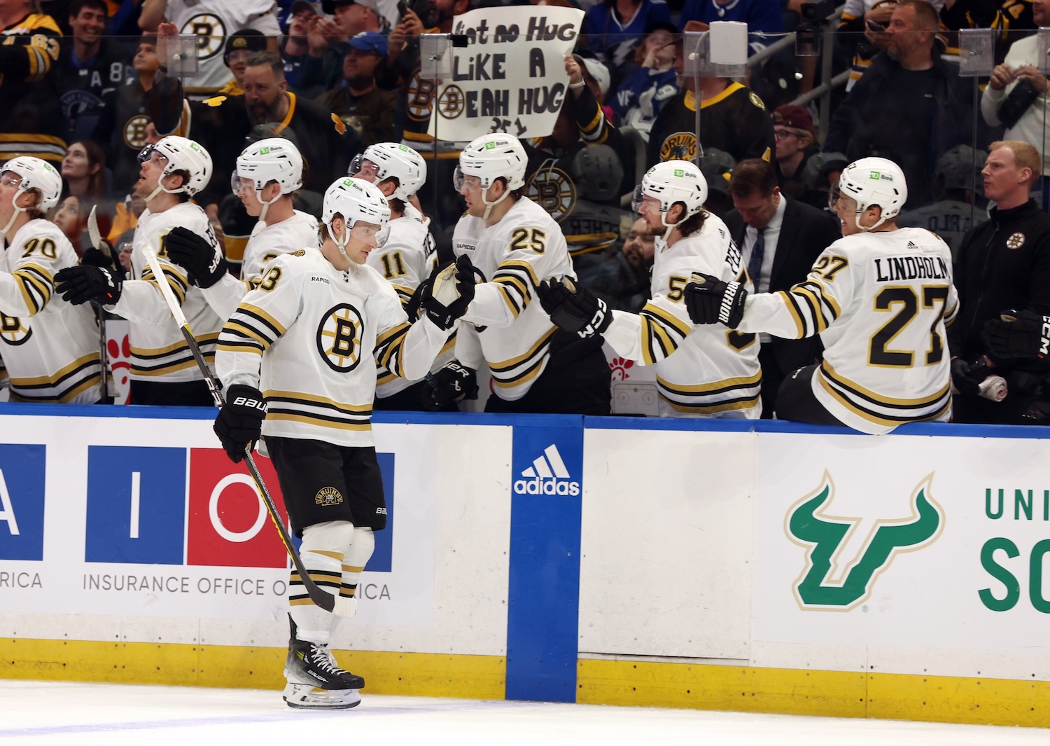 Mar 27, 2024; Tampa, Florida, USA; Boston Bruins left wing Danton Heinen (43) is congratulated after he scored a goal against the Tampa Bay Lightning during the first period at Amalie Arena. Mandatory Credit: Kim Klement Neitzel-USA TODAY Sports