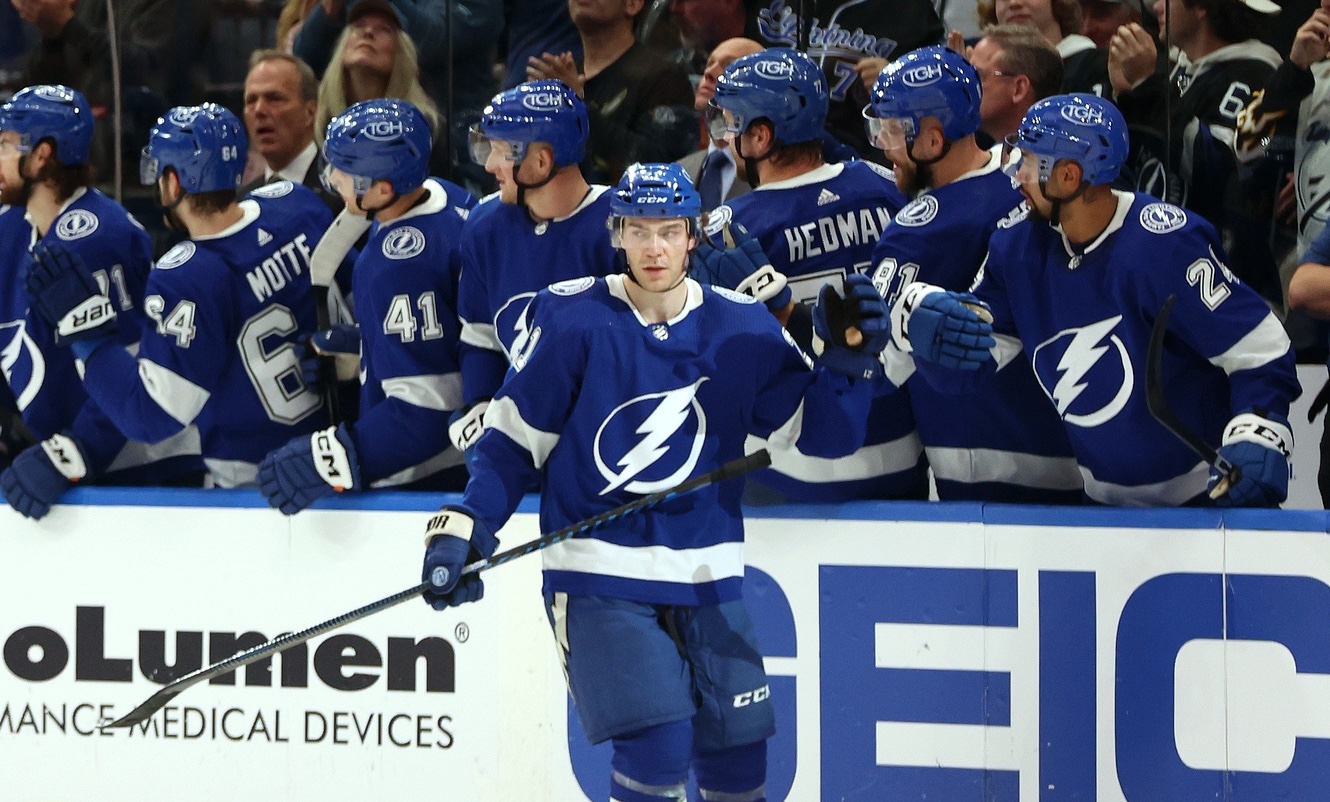 Mar 27, 2024; Tampa, Florida, USA; Tampa Bay Lightning center Brayden Point (21) is congratulated after he scored as goal against the Boston Bruins during the second period at Amalie Arena. Mandatory Credit: Kim Klement Neitzel-USA TODAY Sports