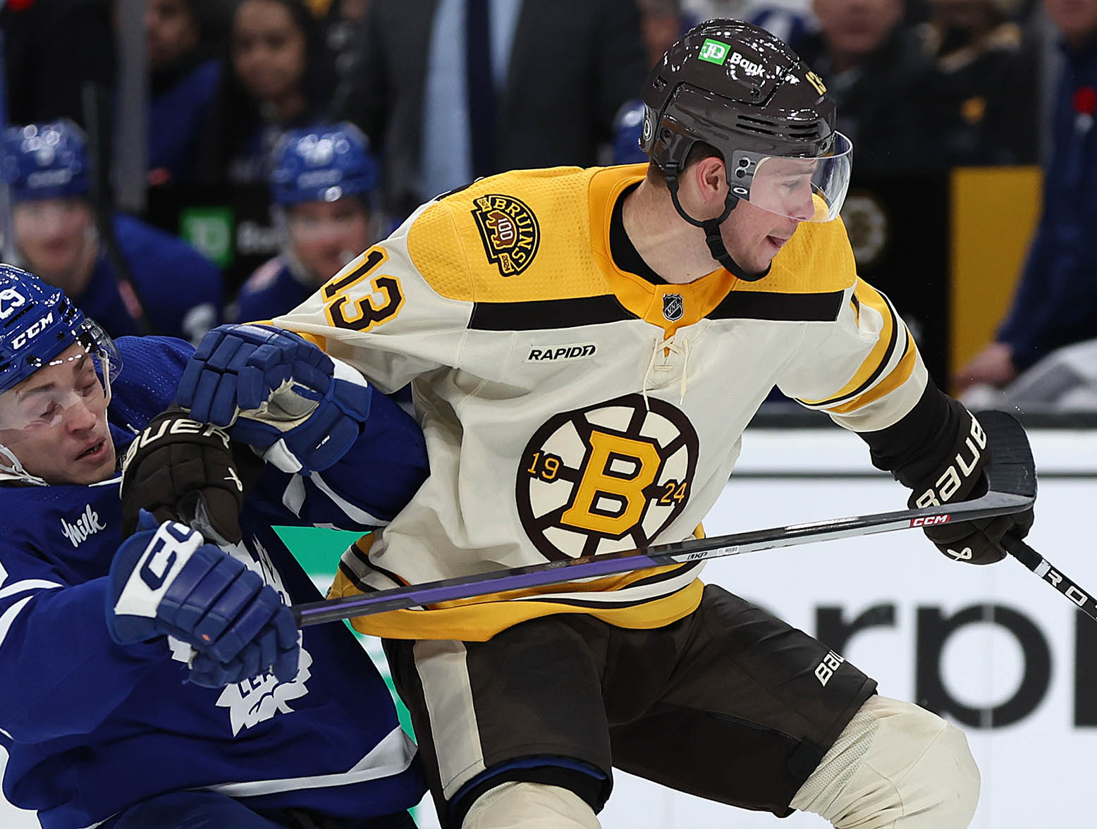 BOSTON, MASSACHUSETTS - NOVEMBER 02: Pontus Holmberg #29 of the Toronto Maple Leafs collides with Charlie Coyle #13 of the Boston Bruins during the third period at TD Garden on November 02, 2023 in Boston, Massachusetts. The Bruins defeat the Maple Leafs 3-2 in overtime. (Photo by Maddie Meyer/Getty Images)
