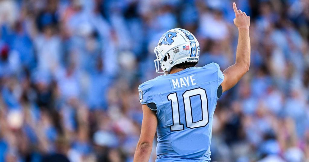 CHAPEL HILL, NORTH CAROLINA - OCTOBER 07: Drake Maye #10 of the North Carolina Tar Heels reacts after throwing for a touchdown against the Syracuse Orange during the second half of their game at Kenan Memorial Stadium on October 07, 2023 in Chapel Hill, North Carolina. The Tar Heels won 40-7. (Photo by Grant Halverson/Getty Images)