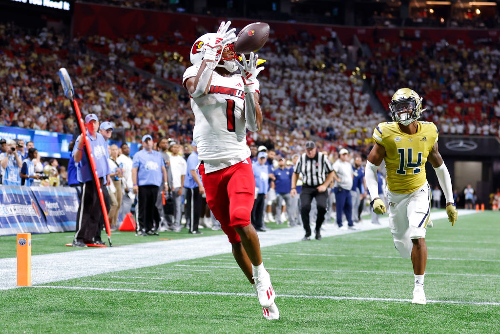 ATLANTA, GEORGIA - SEPTEMBER 1: Jamari Thrash #1 of the Louisville Cardinals pulls in a touchdown reception during the second half against the Georgia Tech Yellow Jackets at Mercedes-Benz Stadium on September 1, 2023 in Atlanta, Georgia. (Photo by Todd Kirkland/Getty Images)