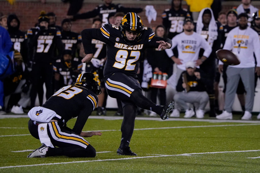 COLUMBIA, MISSOURI - NOVEMBER 18: Place kicker Harrison Mevis #92 of the Missouri Tigers kicks a game-winning field goal against the Florida Gators in the second half at Faurot Field/Memorial Stadium on November 18, 2023 in Columbia, Missouri. (Photo by Ed Zurga/Getty Images)
