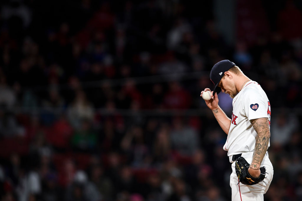 BOSTON, MASSACHUSETTS - APRIL 17: Tanner Houck #89 of the Boston Red Sox gets ready to pitch the ball during the eighth inning of a game against the Cleveland Guardians at Fenway Park on April 17, 2024 in Boston, Massachusetts. (Photo by Jaiden Tripi/Getty Images)