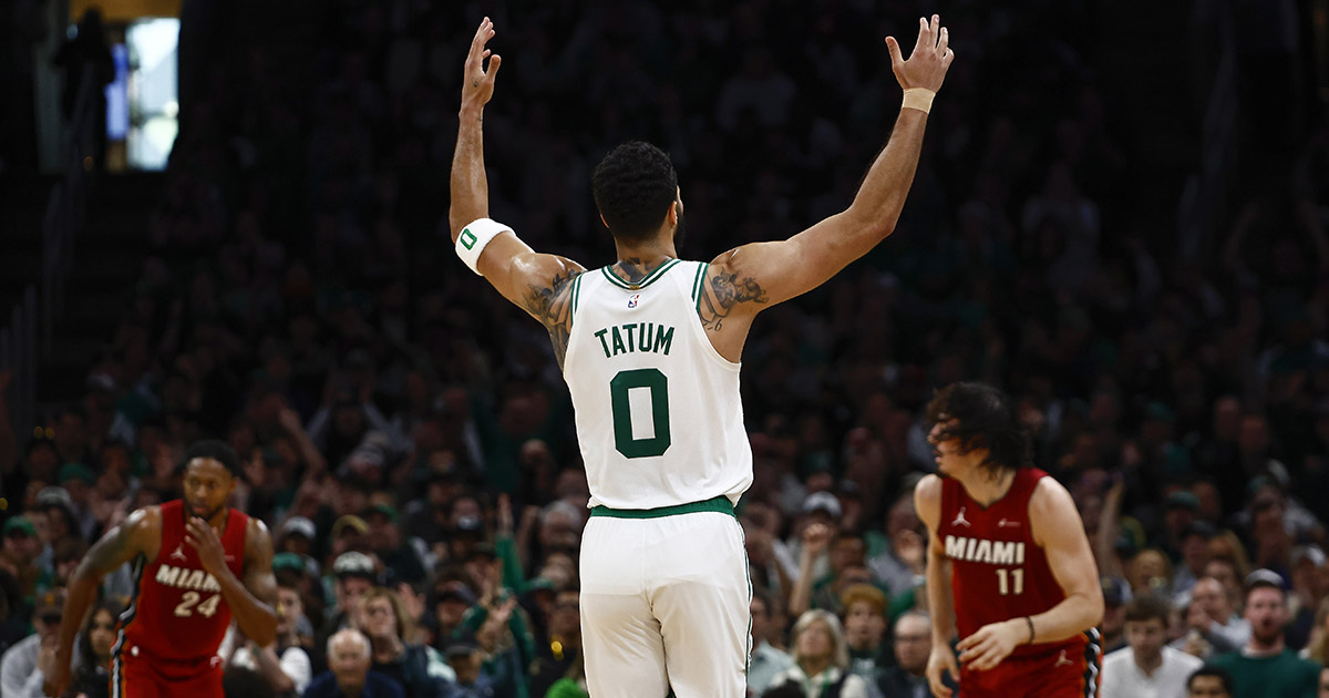 BOSTON, MA - APRIL 21: Jayson Tatum #0 of the Boston Celtics raises his hands after making a three point basket against the Miami Heat during the first quarter of game one of the Eastern Conference First Round Playoffs at TD Garden on April 21, 2024 in Boston, Massachusetts. (Photo By Winslow Townson/Getty Images)