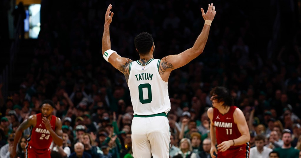 BOSTON, MA - APRIL 21: Jayson Tatum #0 of the Boston Celtics raises his hands after making a three point basket against the Miami Heat during the first quarter of game one of the Eastern Conference First Round Playoffs at TD Garden on April 21, 2024 in Boston, Massachusetts. (Photo By Winslow Townson/Getty Images)