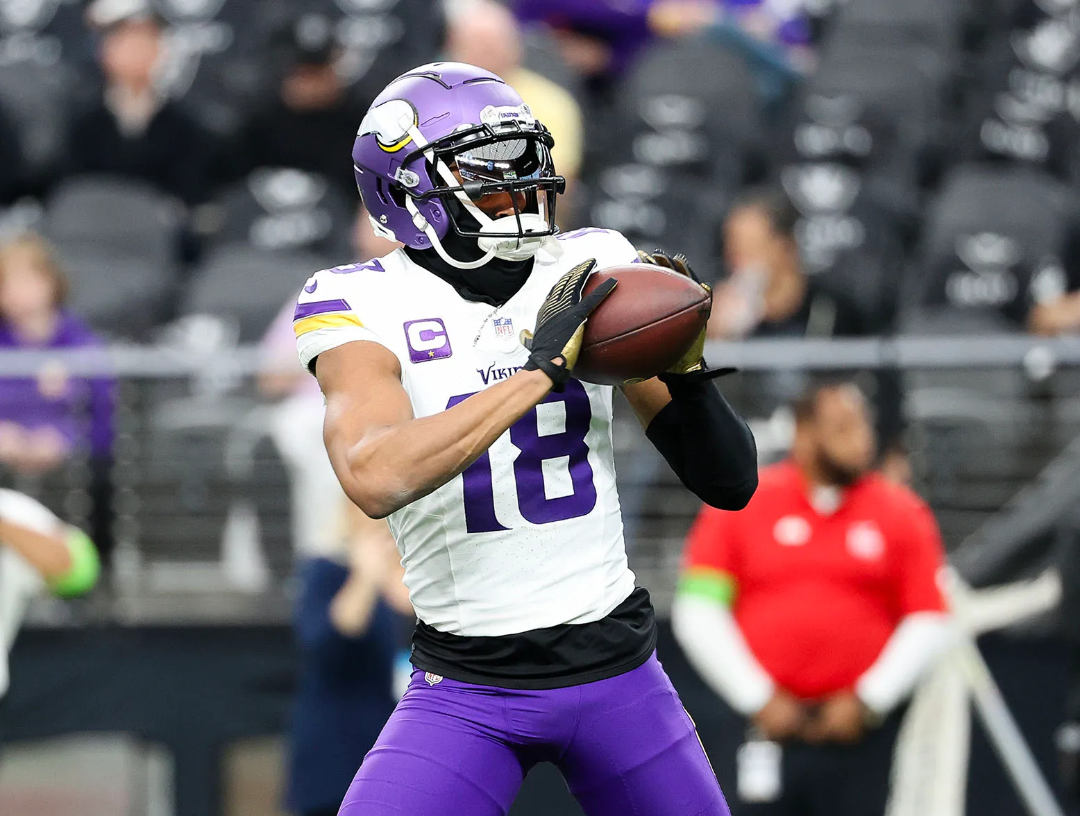 LAS VEGAS, NEVADA - DECEMBER 10: Justin Jefferson #18 of the Minnesota Vikings warms up before the game against the Las Vegas Raiders at Allegiant Stadium on December 10, 2023 in Las Vegas, Nevada. (Photo by Ian Maule/Getty Images)
