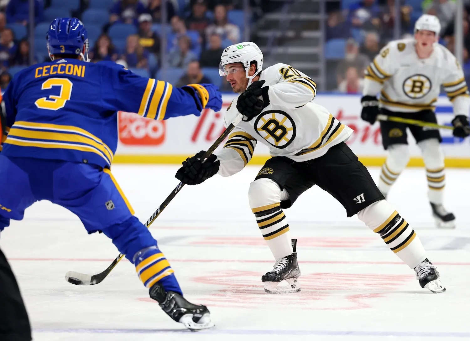 Sep 26, 2023; Buffalo, New York, USA; Boston Bruins center Jayson Megna (20) looks to make a pass during the first period against the Buffalo Sabres at KeyBank Center. Mandatory Credit: Timothy T. Ludwig-USA TODAY Sports