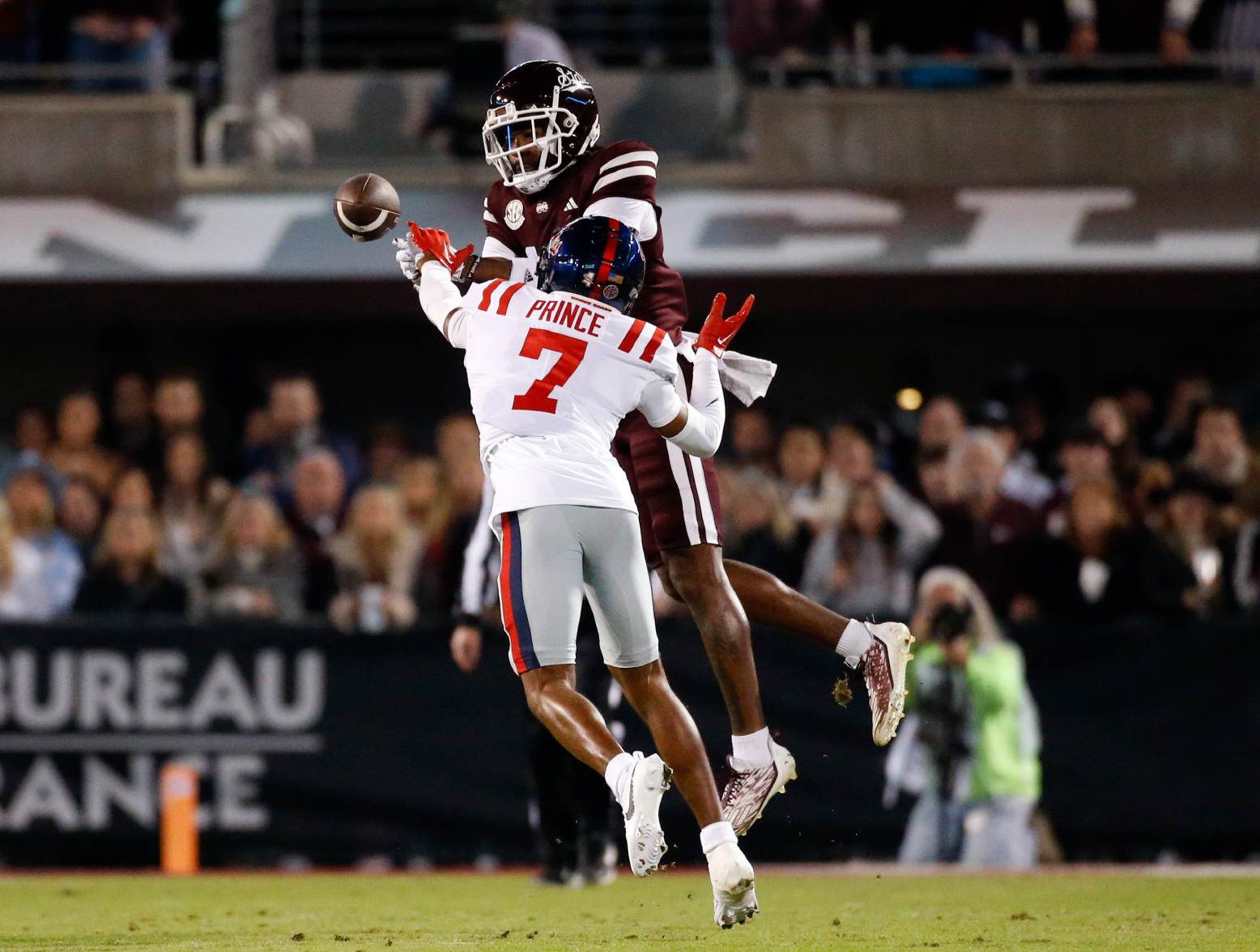 Nov 23, 2023; Starkville, Mississippi, USA; Mississippi Rebels defensive back Deantre Prince (7) breaks up a pass during the first half against the Mississippi State Bulldogs at Davis Wade Stadium at Scott Field. Credit: Petre Thomas-USA TODAY Sports