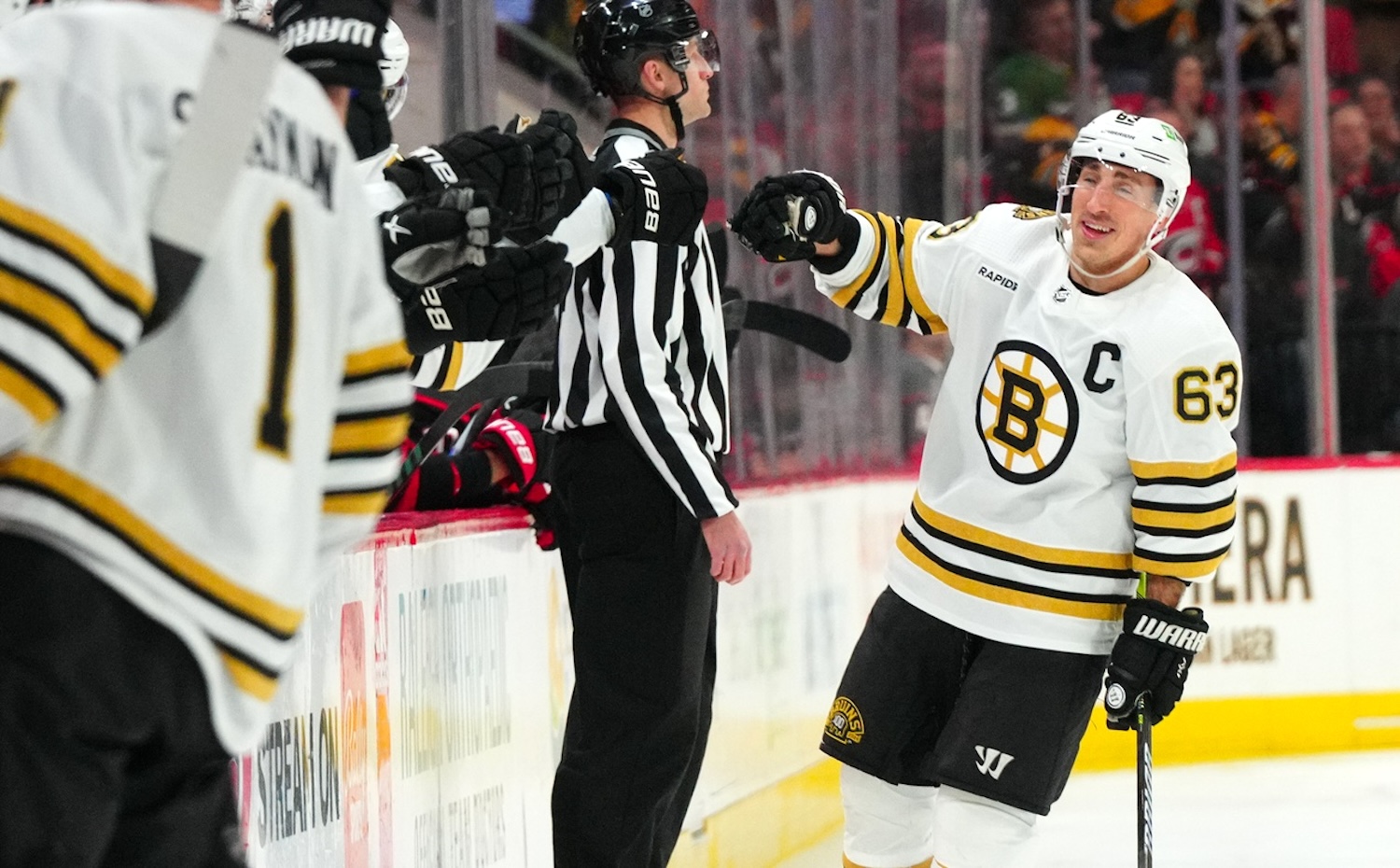 Apr 4, 2024; Raleigh, North Carolina, USA; Boston Bruins left wing Brad Marchand (63) celebrates his goal against the Carolina Hurricanes during the first period at PNC Arena. Mandatory Credit: James Guillory-USA TODAY Sports