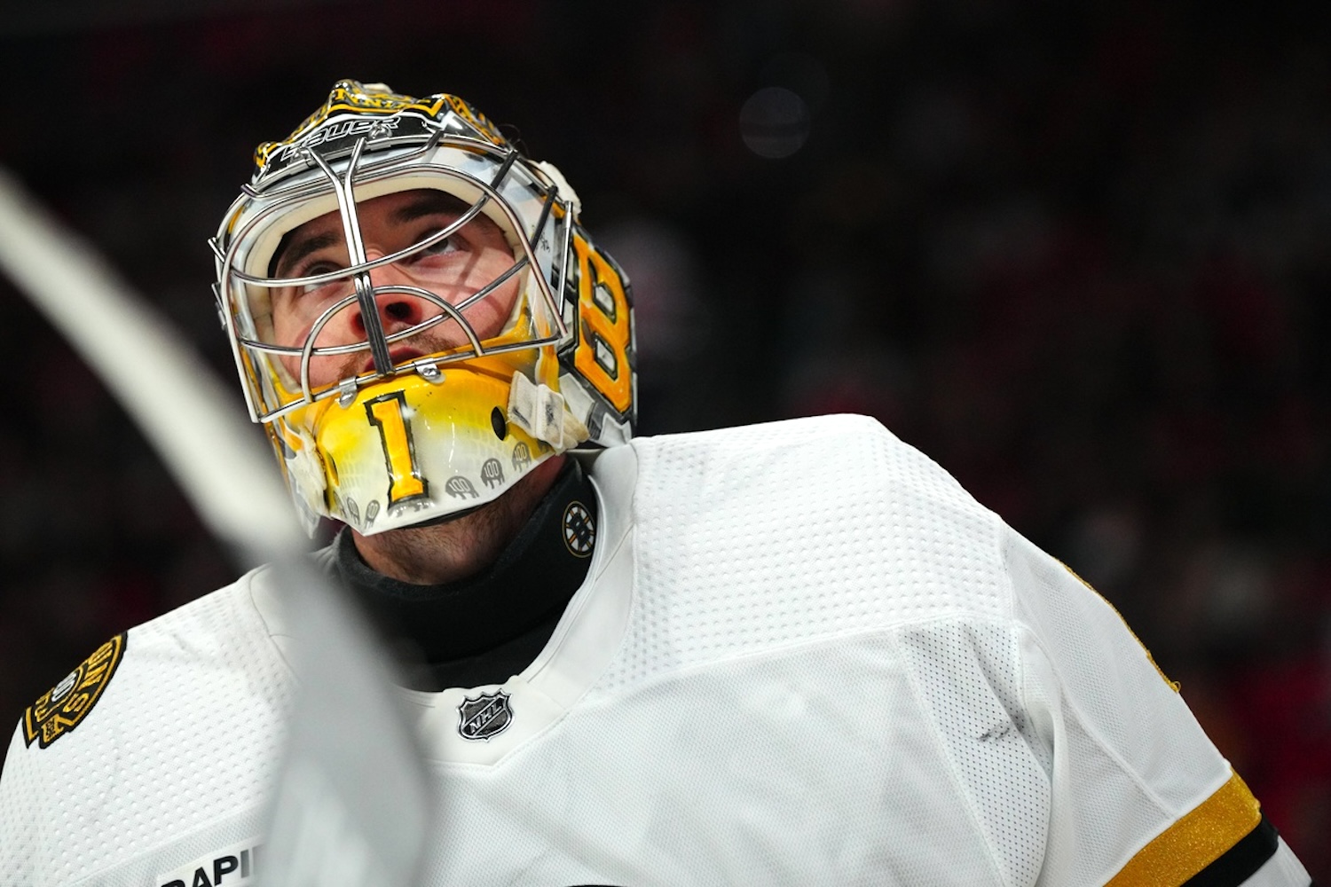 Apr 4, 2024; Raleigh, North Carolina, USA; Boston Bruins goaltender Jeremy Swayman (1) looks on against the Carolina Hurricanes during the third period at PNC Arena. Mandatory Credit: James Guillory-USA TODAY Sports