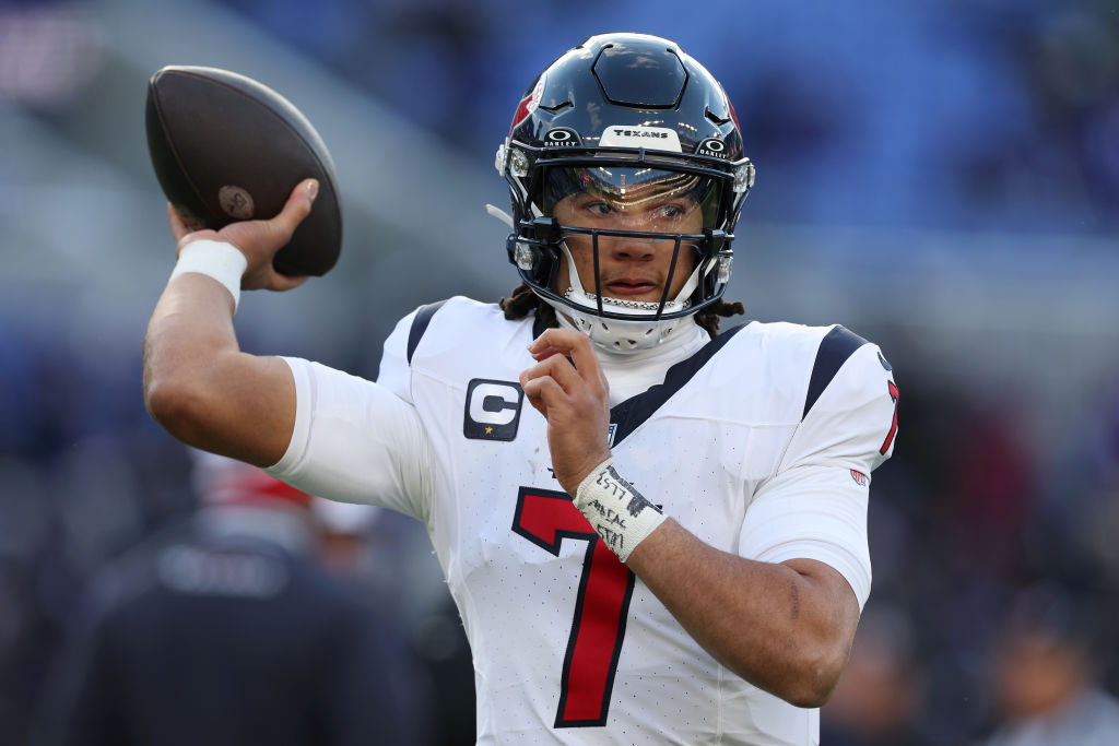 BALTIMORE, MARYLAND - JANUARY 20: C.J. Stroud #7 of the Houston Texans warms up prior to the AFC Divisional Playoff game against the Baltimore Ravens at M&T Bank Stadium on January 20, 2024 in Baltimore, Maryland. (Photo by Rob Carr/Getty Images)