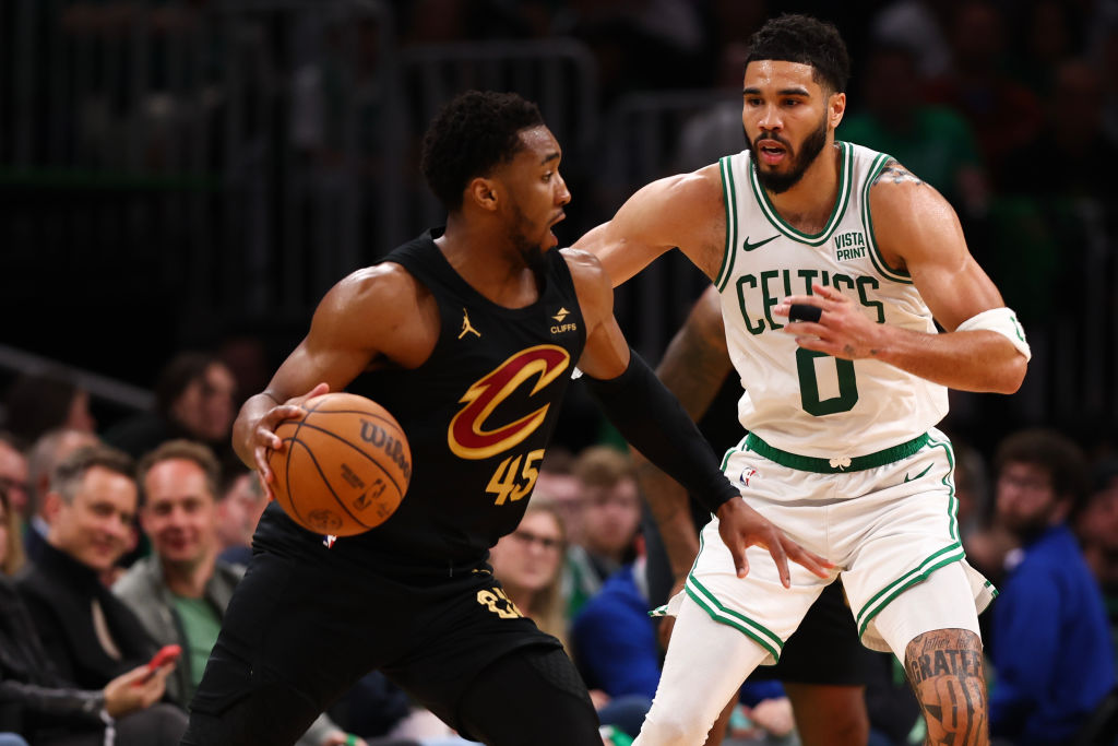 BOSTON, MASSACHUSETTS - MAY 09: Jayson Tatum #0 of the Boston Celtics defends Donovan Mitchell #45 of the Cleveland Cavaliers during the fourth quarter in Game Two of the Eastern Conference Second Round Playoffs at TD Garden on May 09, 2024 in Boston, Massachusetts. (Photo by Maddie Meyer/Getty Images)