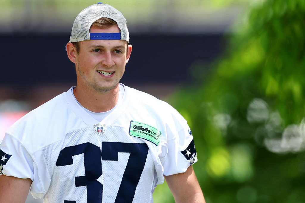 FOXBOROUGH, MASSACHUSETTS - MAY 29: Chad Ryland #37 of the New England Patriots walks to the field during the New England Patriots OTA Offseason Workout on May 29, 2024 in Foxborough, Massachusetts. (Photo by Maddie Meyer/Getty Images)