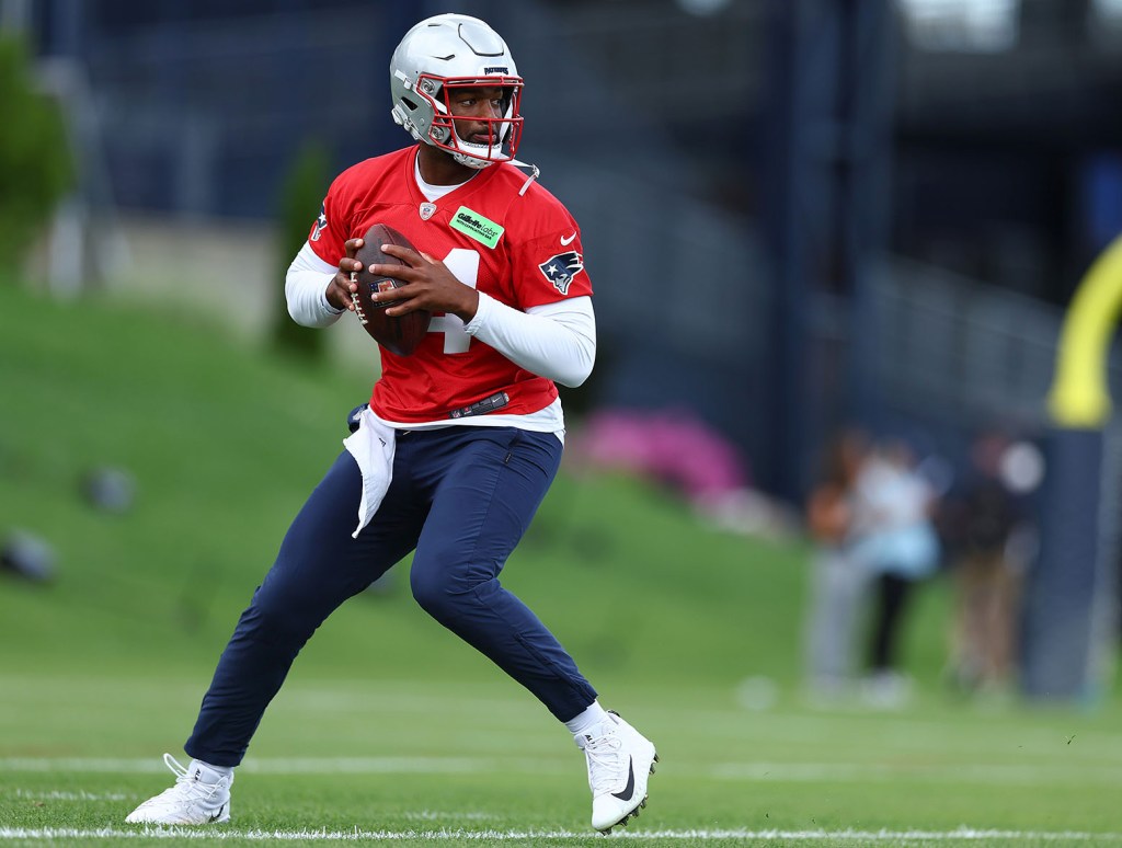 FOXBOROUGH, MASSACHUSETTS - MAY 29: Jacoby Brissett #14 of the New England Patriots makes a pass during the New England Patriots OTA Offseason Workout on May 29, 2024 in Foxborough, Massachusetts. (Photo by Maddie Meyer/Getty Images)