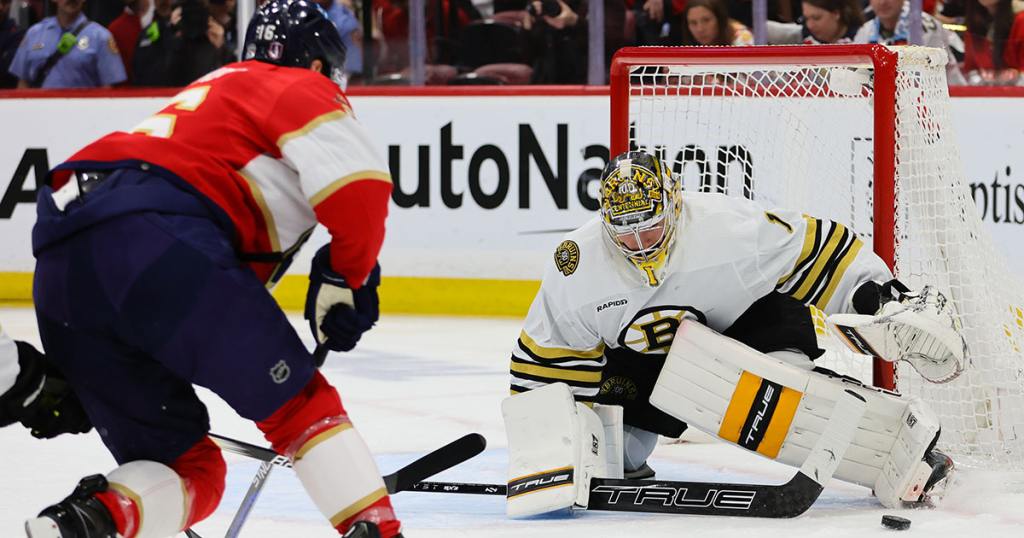 May 8, 2024; Sunrise, Florida, USA; Boston Bruins goaltender Jeremy Swayman (1) makes a save against Florida Panthers center Aleksander Barkov (16) during the first period in game two of the second round of the 2024 Stanley Cup Playoffs at Amerant Bank Arena. Mandatory Credit: Sam Navarro-USA TODAY Sports