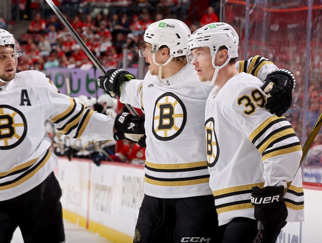 SUNRISE, FLORIDA - MAY 14: Morgan Geekie #39 of the Boston Bruins celebrates with teammates after a goal during the first period against the Florida Panthers in Game Five of the Second Round of the 2024 Stanley Cup Playoffs at Amerant Bank Arena on May 14, 2024 in Sunrise, Florida. (Photo by Joel Auerbach/Getty Images)
