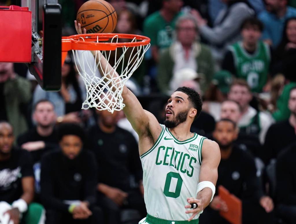 May 21, 2024; Boston, Massachusetts, USA; Boston Celtics forward Jayson Tatum (0) shoots the ball against the Indiana Pacers in the first half for game one of the eastern conference finals for the 2024 NBA playoffs at TD Garden. Credit: David Butler II-USA TODAY Sports