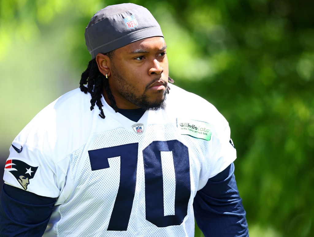 FOXBOROUGH, MASSACHUSETTS - MAY 29: Caedan Wallace #70 of the New England Patriots walks to the field during the New England Patriots OTA Offseason Workout on May 29, 2024 in Foxborough, Massachusetts. (Photo by Maddie Meyer/Getty Images) Patriots offensive line