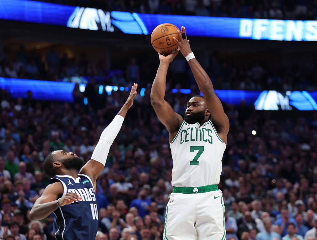 DALLAS, TEXAS - JUNE 12: Jaylen Brown #7 of the Boston Celtics attempts a shot while being guarded by Tim Hardaway Jr. #10 of the Dallas Mavericks in the fourth quarter in Game Three of the 2024 NBA Finals at American Airlines Center on June 12, 2024 in Dallas, Texas. (Photo by Stacy Revere/Getty Images)