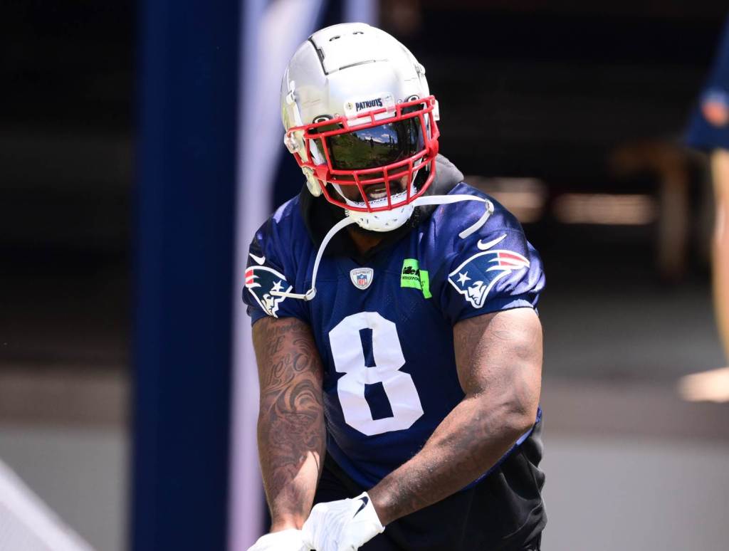 Jun 10, 2024; Foxborough, MA, USA; New England Patriots linebacker Ja'Whaun Bentley (8) walks to the practice fields for minicamp at Gillette Stadium. Credit: Eric Canha-USA TODAY Sports